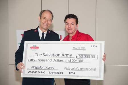 Major Ron Busroe, The Salvation Army’s national community relations and development secretary, and John Schnatter, founder of Papa John’s Photo by Brian Bohannon