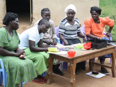 Family sitting at table in Kenya