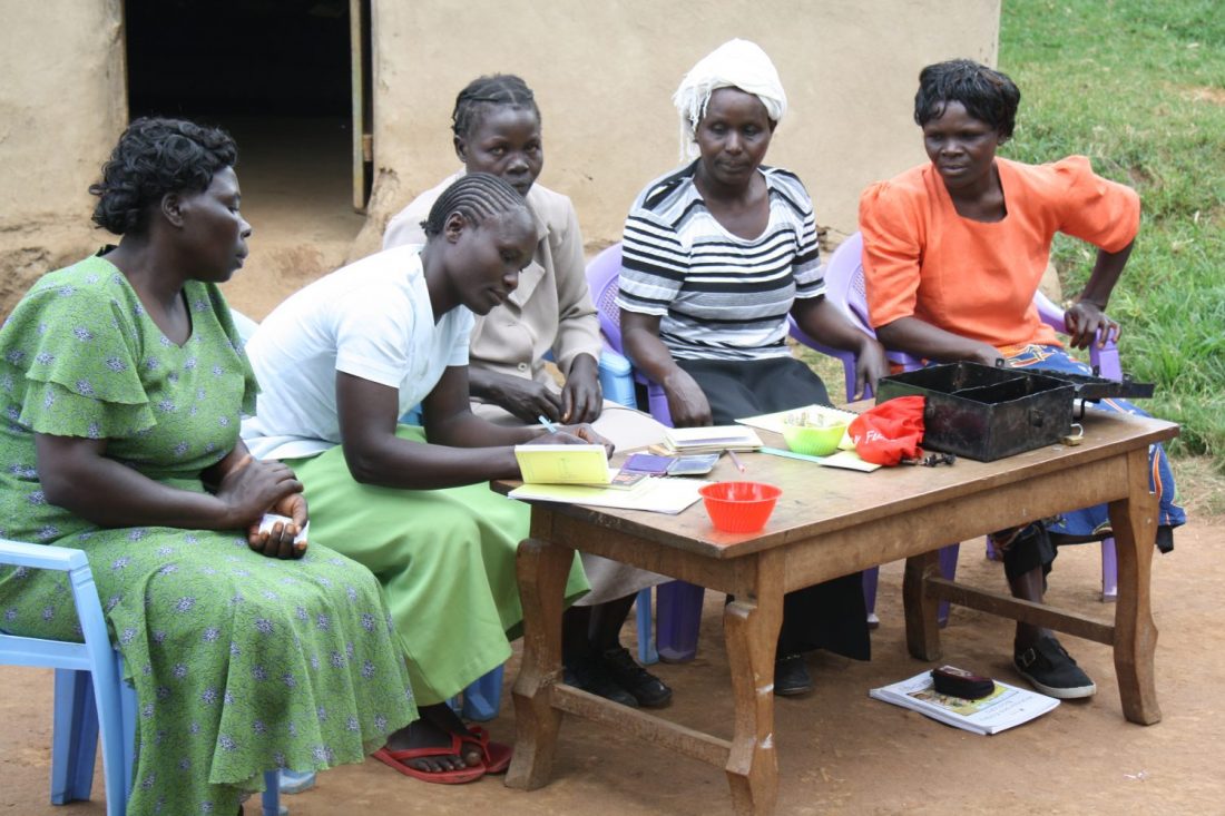Family sitting at table in Kenya