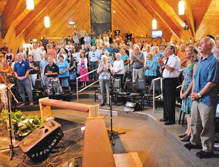 Salvation Army leaders join in worship with Salvationists from throughout the Western Territory at  WBC. Photo by Ron Bawden