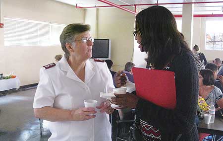 Major Katherine Hodder-Reed talks with open house attendee. Photos by Cindy Engler