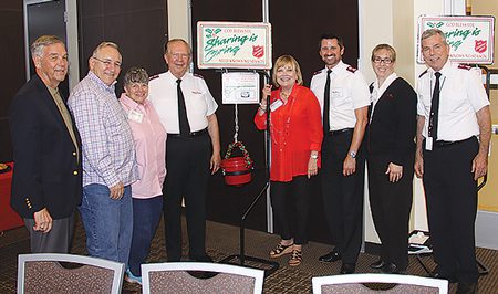 Advisory board members and Salvation Army officers pictured after a Real Estate Wednesdays launch meeting are (l-r) Tom Leyda, Joseph and JoAnn Callaway, Colonel Olin Hogan, Marlene Klotz-Collins, Majors John and  Pamilla Brackenbury and Lt. Colonel Joe Posillico.               Photo by Aaron Blackburn