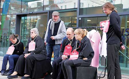 “Slaves” for sale outside International Headquarters in London raised awareness of human trafficking.         Photo courtesy of Salvation Army International