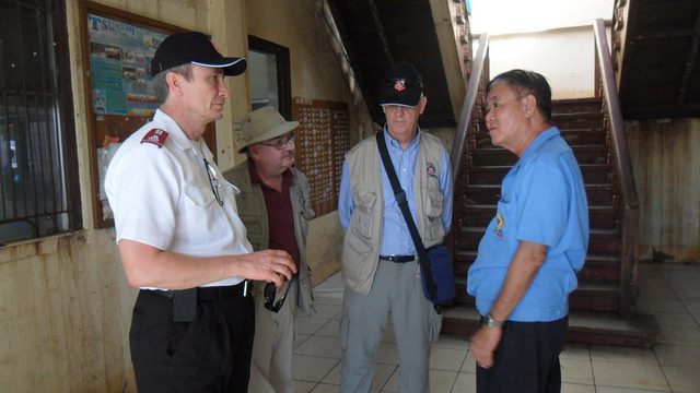 Col Bill Mockabee (SAWSO); Major Mike McKee (IES deployee), Major Ray Brown (IES) with the Mayor of Dulag during field visit - Dulag