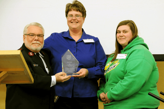 Michele Roberts and Audrey accepting the award on behalf of Fred Meyer.