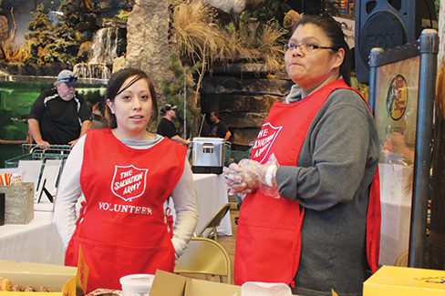 ARC beneficiaries help at Salvation Army event.