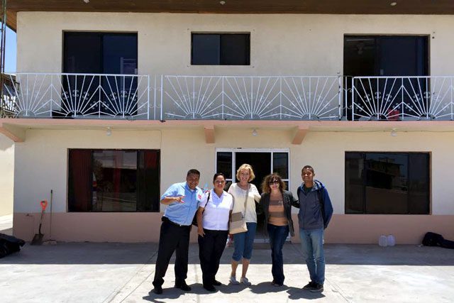 Army staffers outside of Casa Puerta de Esperanza prior to the grand opening.