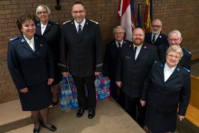 Water of Life Concert: (l-r) Ruth Rowland, Gillian Morton, John Lam, Al Rowland, Captain Caleb Senn, Keith Morton, Jim Smith and Gen Smith