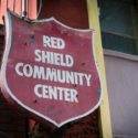 red shield community center sign