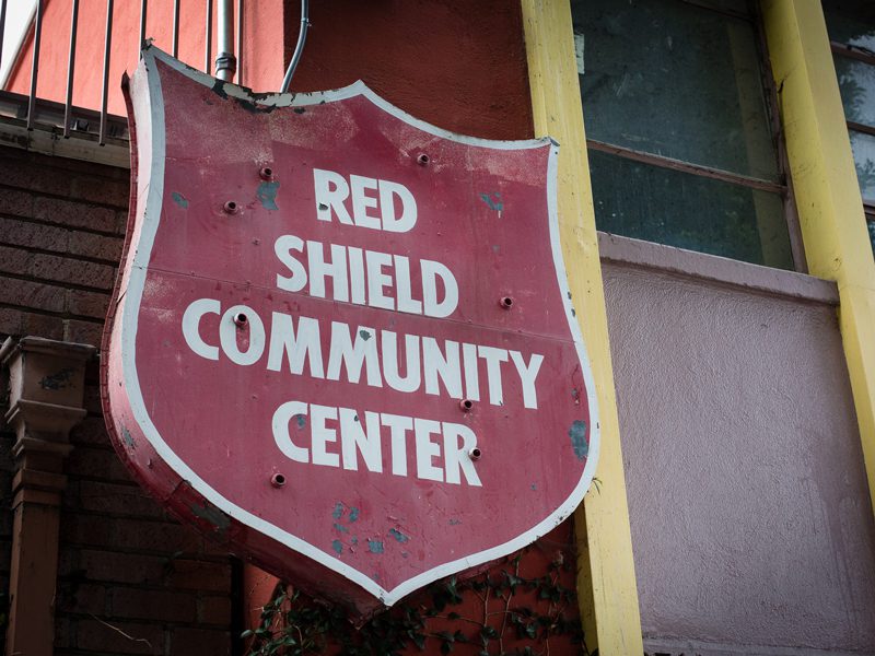 red shield community center sign