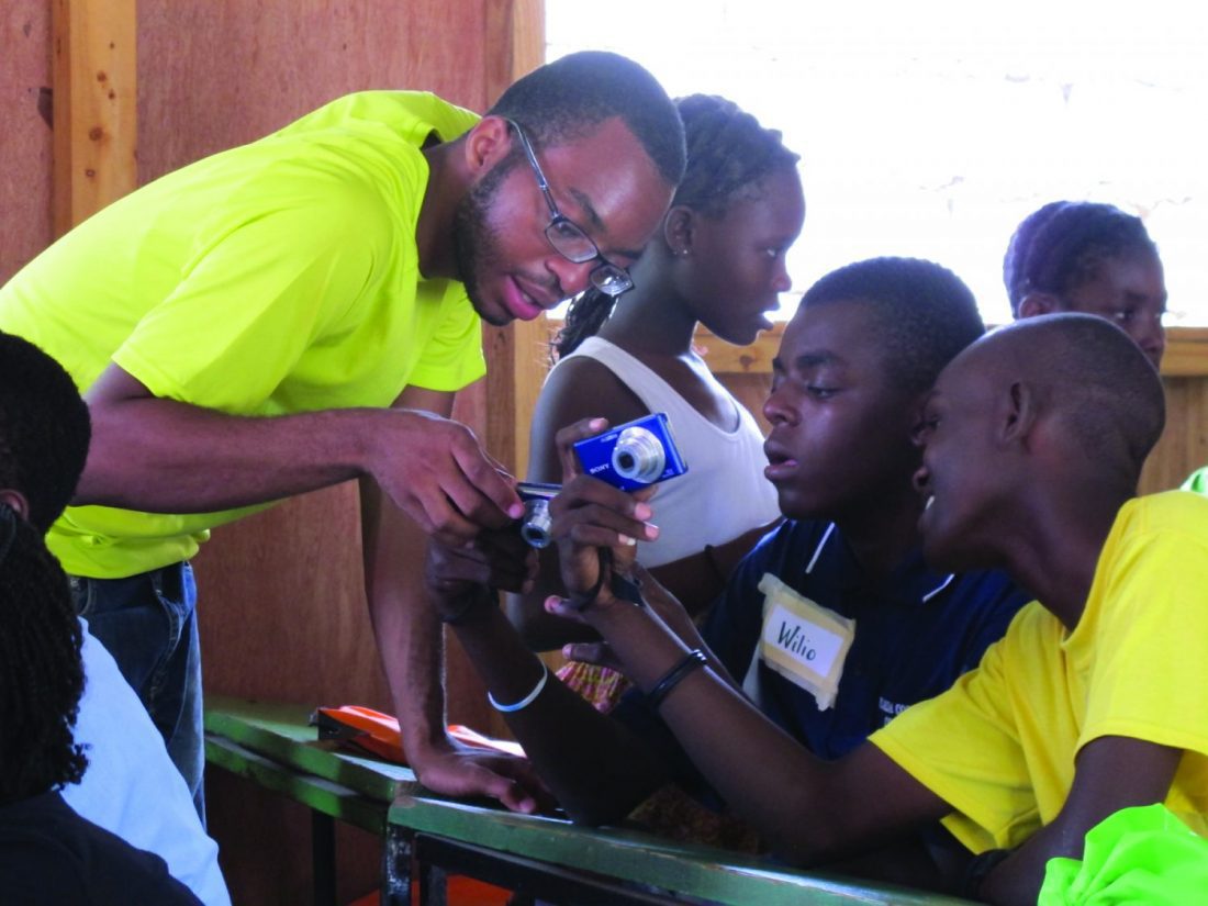 Man looking at camera with kids