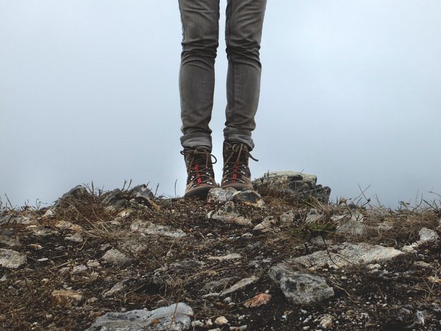 Person standing on rocks