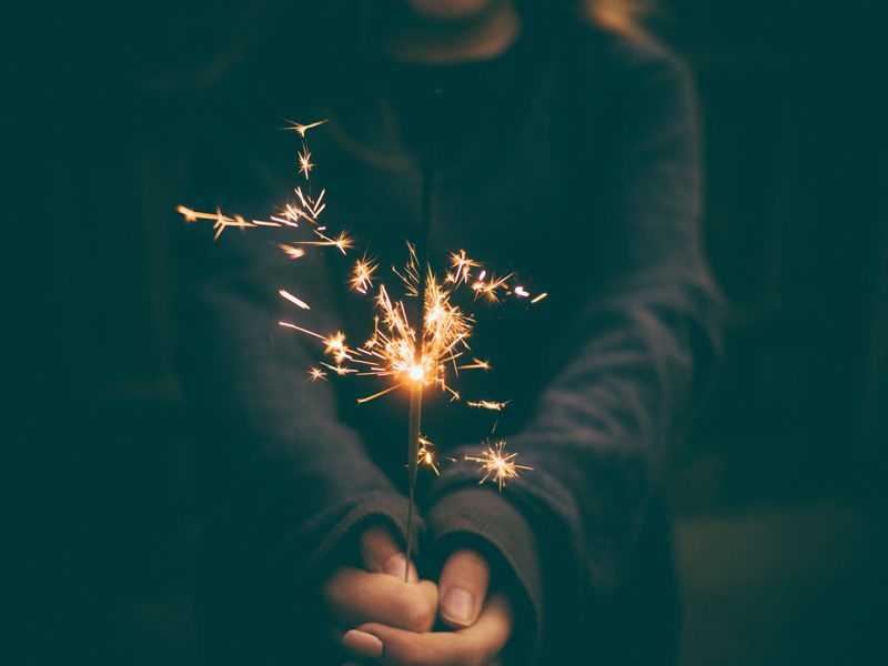 Person holding sparkler