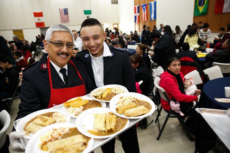 Soldiers and friends enjoy a tamale lunch following the United Latino Rally at Los Angeles Central Corps on Jan. 1.