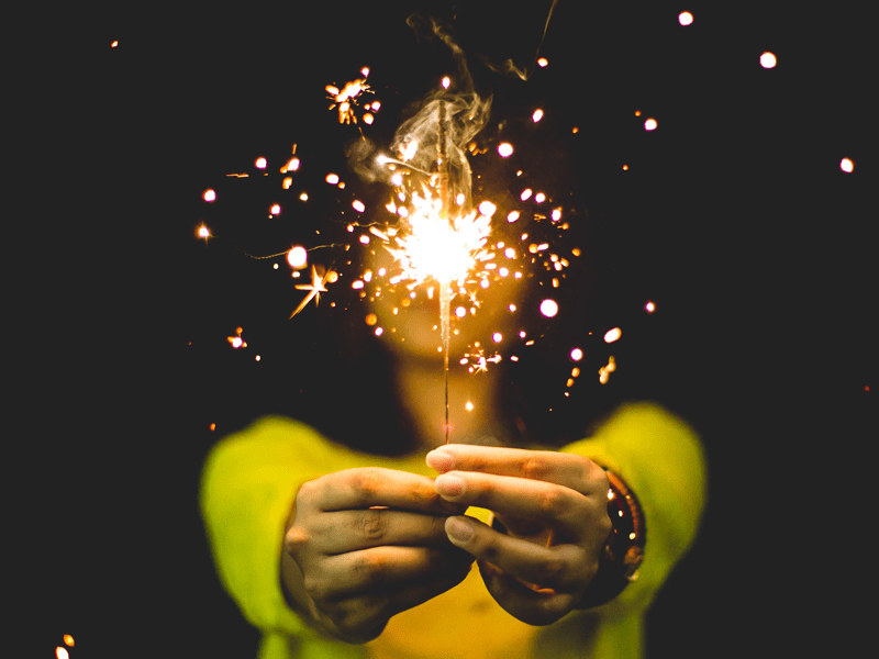 Woman holding sparkler