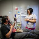 Nurse smiling with patient