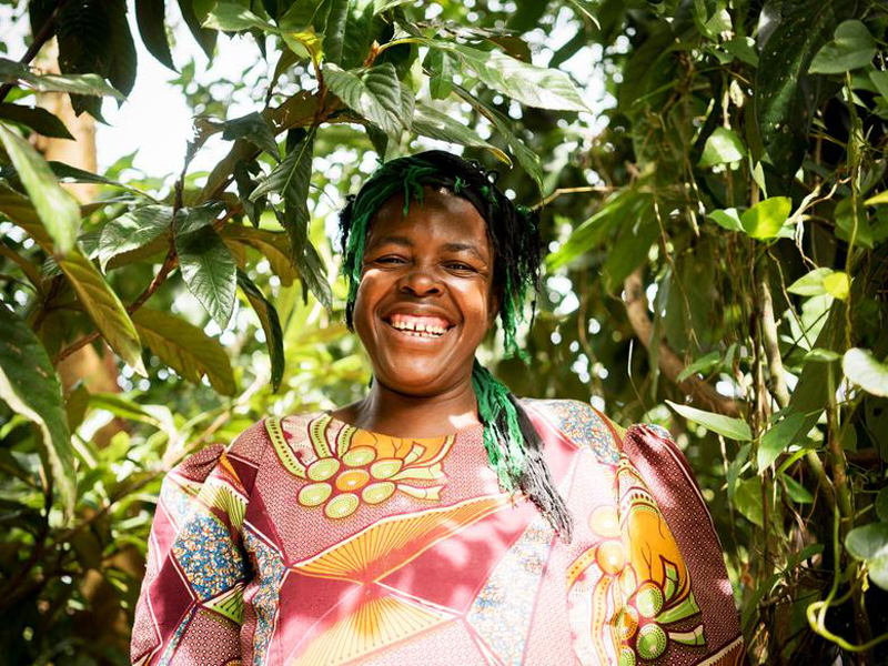 Woman smiling outside in shade