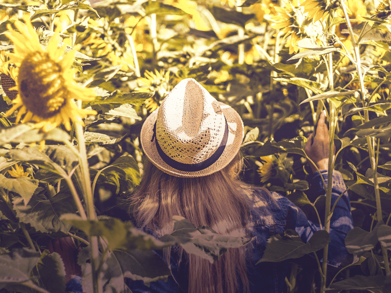 Woman in hat outside