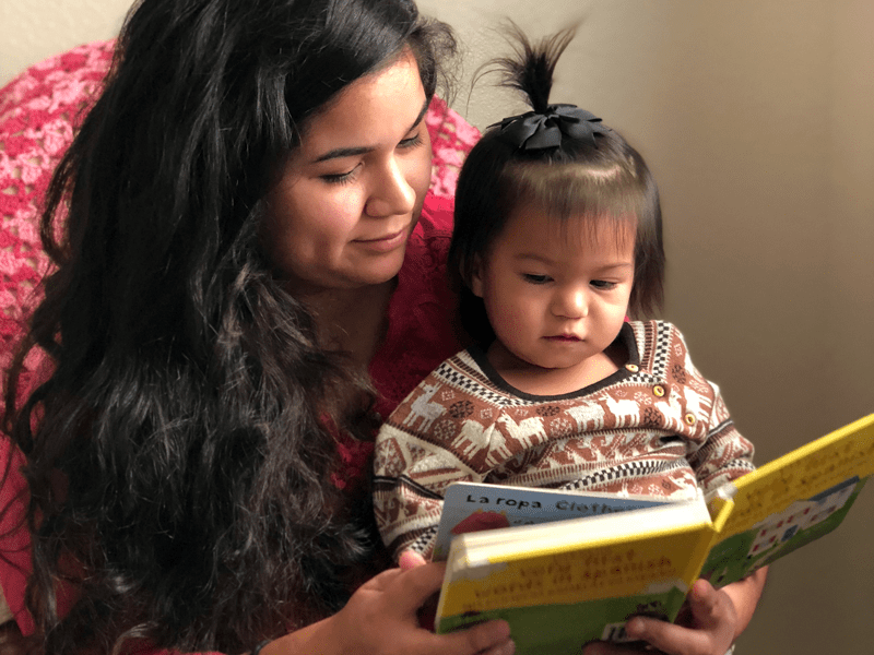 mother reading to child