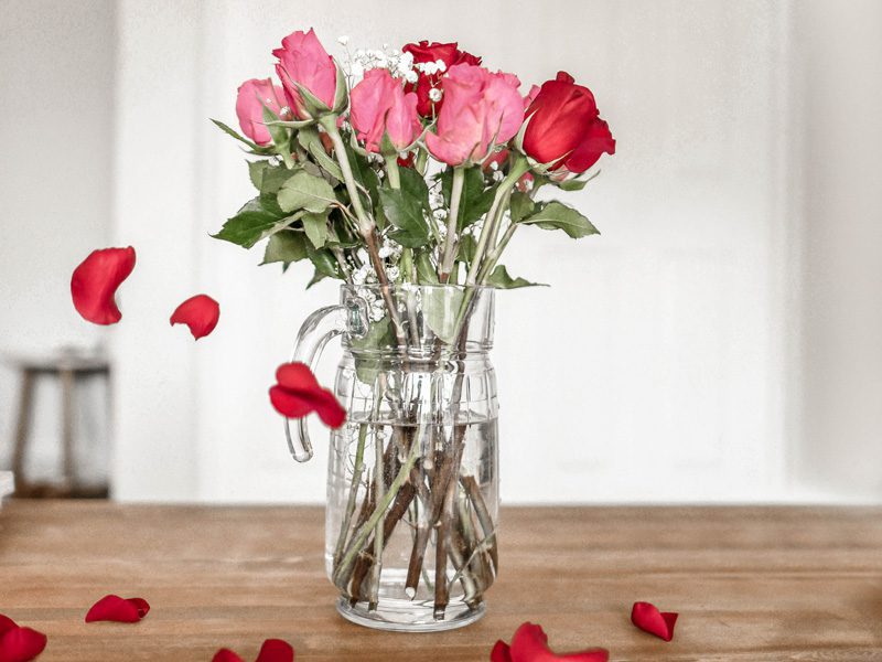 Roses in vase on table