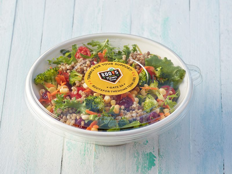 Salad in bowl with plastic cover