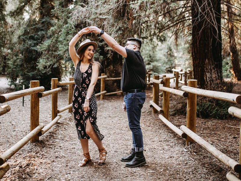 Man and woman dancing outside