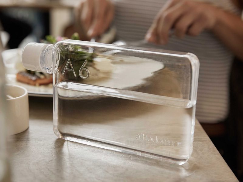 momobottle water bottle on table