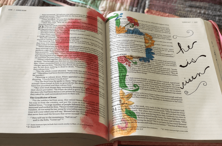 Bible journaling with cross drawn on inside of Bible