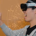 Profile of youth wearing augmented reality goggles