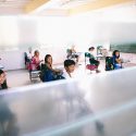 children sitting at desks in school