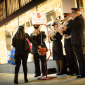 Band playing at red kettle