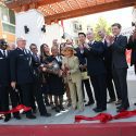 Priscilla Hunt cutting ribbon