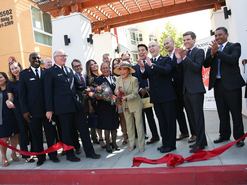 Priscilla Hunt cutting ribbon