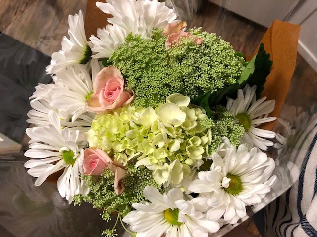 Flowers Being Prepared for Bouquet 