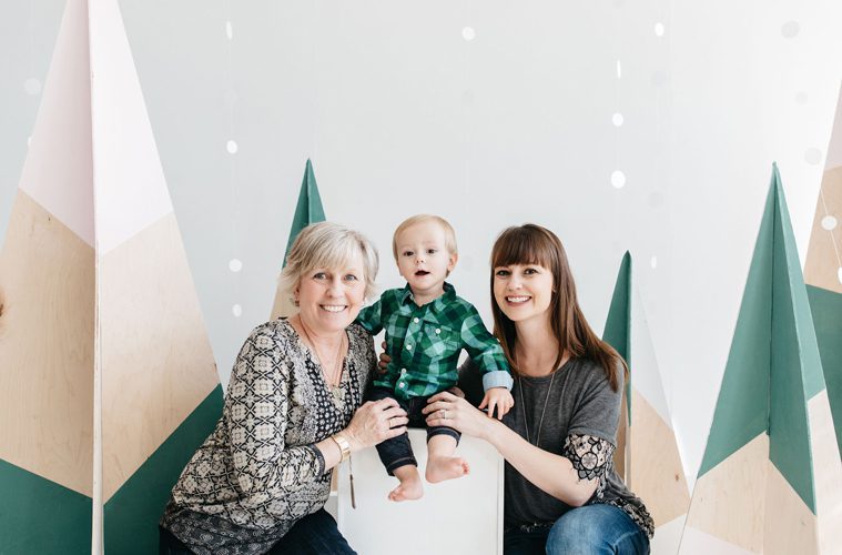 Christin Thieme, Her Mother, and Christin's young son pose for holiday photo