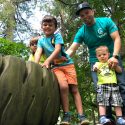 Counselor Joshua Hamilton Playing with Three Kids at Camp