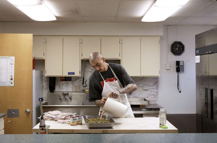 Robert Wallace Preparing Food in Salvation Army Kitchen