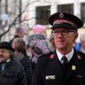 Man in Salvation Army Uniform with Crowd