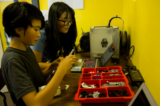 Child working on robotics