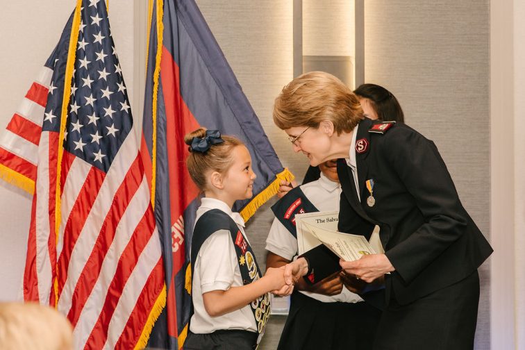 Commissioner Jolene K. Hodder presenting Commissioners Award to Sunbeam Troop