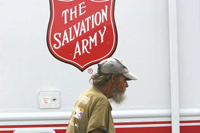 Homeless Man in front of TSA truck