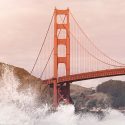 Waves crashing at the bottom of the Golden Gate Bridge