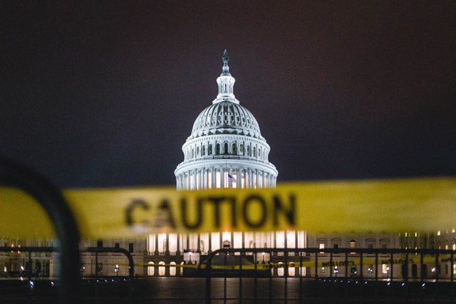 Caution tape in front of Capital