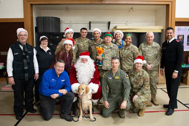 National Guard Members and Salvation Army Members Taking Group Photo