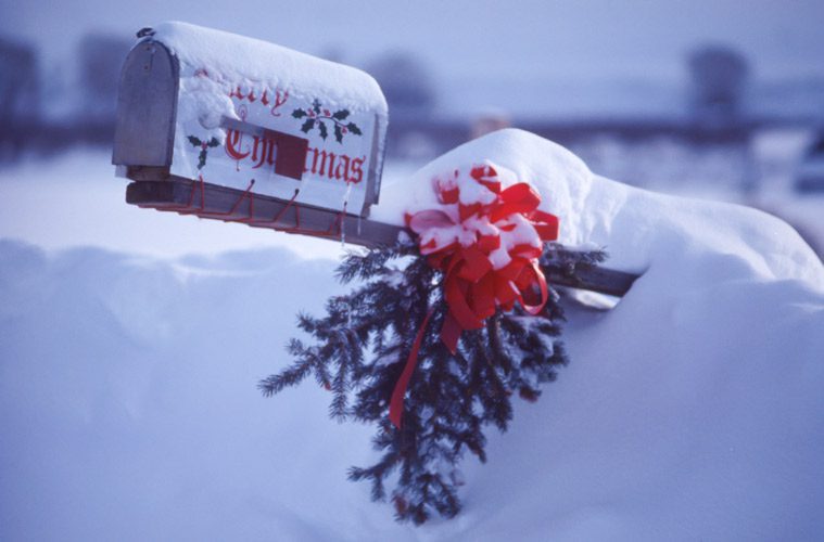 Mailbox and Wreath Covered in Snow