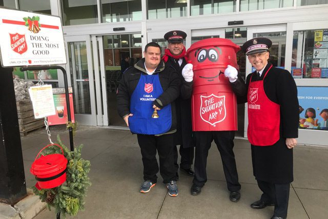 Commissioner Hodder, Harrison, Kettle Man, and Lt. Colonel Bill Dickinson at kettle