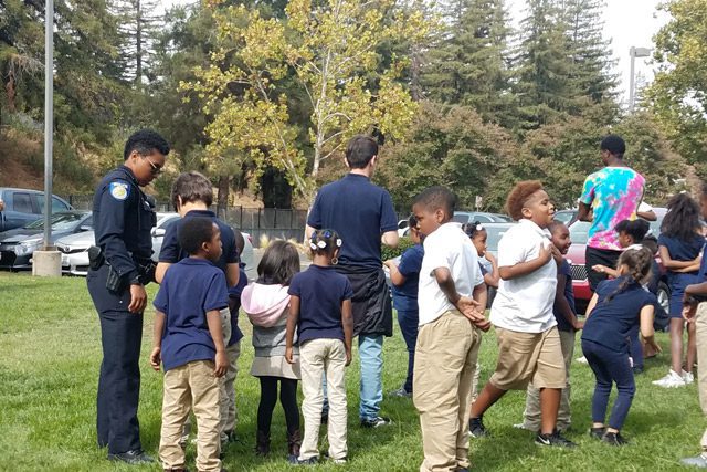 Sacramento Police Department Officer With Group of Kids