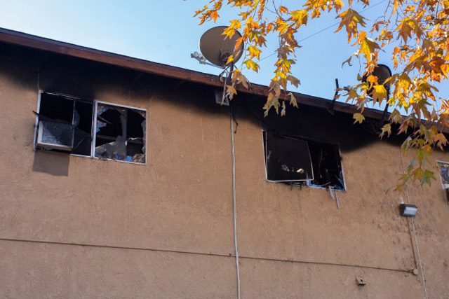 Damage from fire on outside of apartment