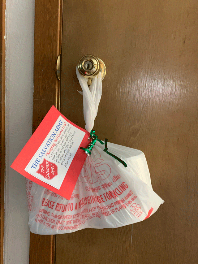 Door with bag hanging on it