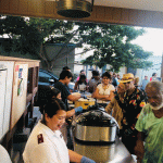 line of people being served food